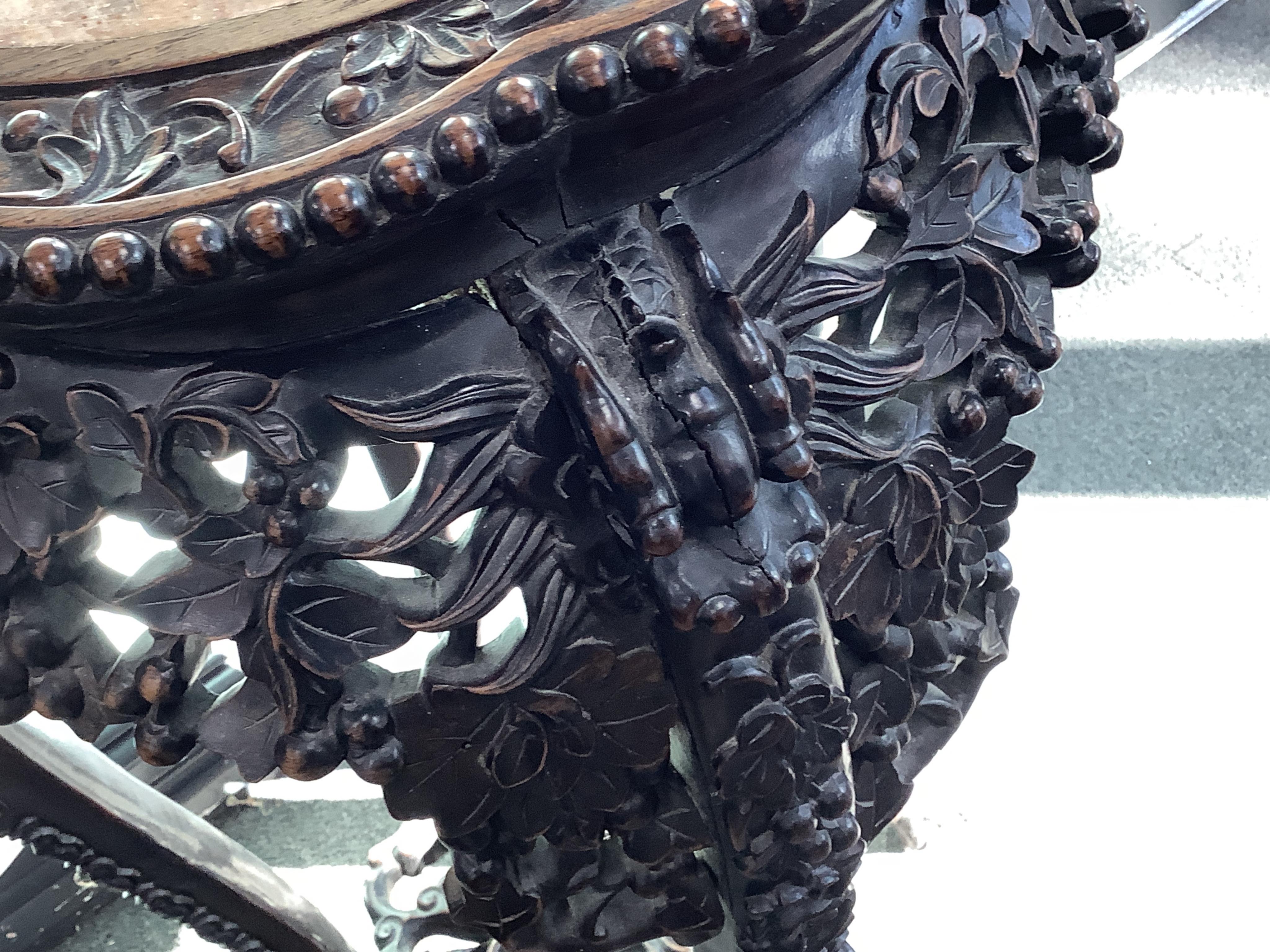 A Chinese carved hongmu rouge marble topped vase stand, diameter 42cm, height 93cm